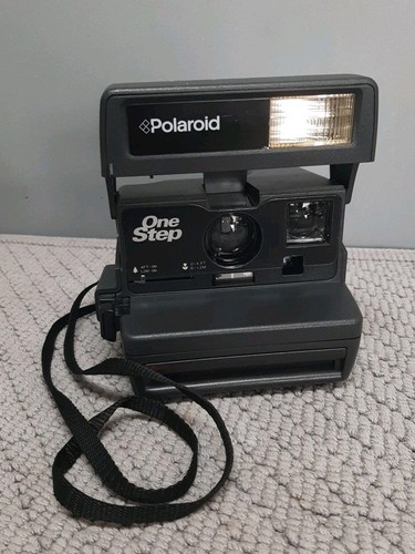 Polaroid one step - one, instant