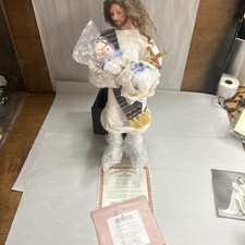 ASHTON DRAKE "NELLE BRACCIA