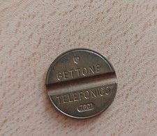 Gettone telefonico con - gettone,