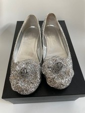 Scarpe Chanel slip on argento