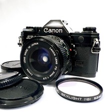 [EXC+5] Canon AE-1 nero/nuovo