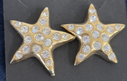 Orecchini stella tono oro con