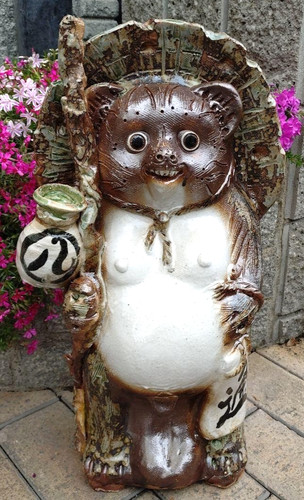 Statua cane procione
