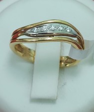 Splendido anello da donna in oro giallo e bianco 18kt con 5 brillanti  per  0,10