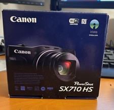 Canon PowerShot SX710 HS fotocamera nella sua confezione · Canon · Nero perfetta