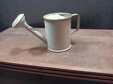 Antico annaffiatoio giocattolo