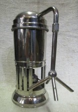 Antica caffettiera con fornellino ad alcool