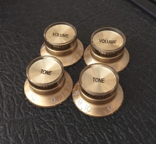 Gold top hat manopole - top,