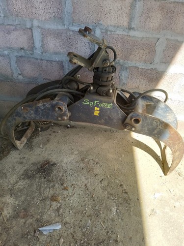 Pinza carica legna per