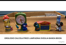 Banda bidon Kinder Ferrero, lampadina sveglia calcolatrice, penna, lotto stock