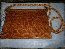 Pochette coccodrillo autentico