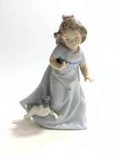 Statuina in ceramica NAO