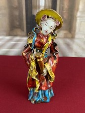 Antica statuina in porcellana