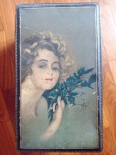 Scatola di latta con donna