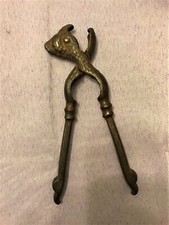 SCHIACCIANOCI IN BRONZO CON