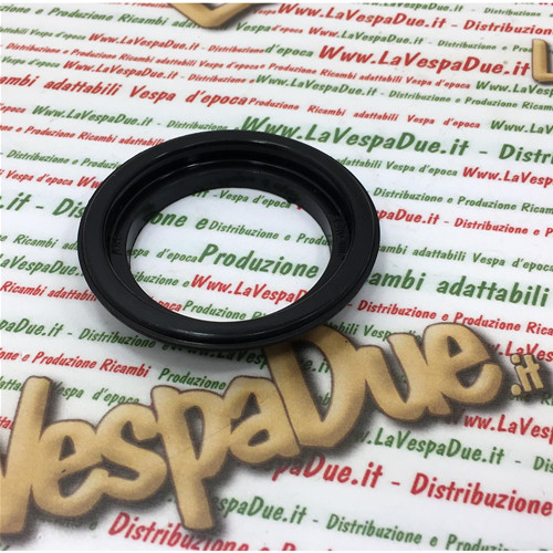 Guarnizione con bordino tappo