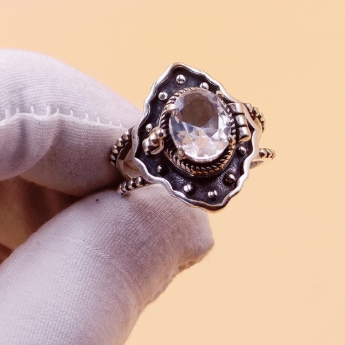 Anello veleno topazio bianco