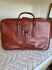 Vecchia valigia pelle vintage