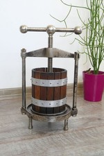 Vecchia pressa per bacche