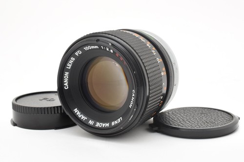 Canon 100 s - f2.8, s.s.c