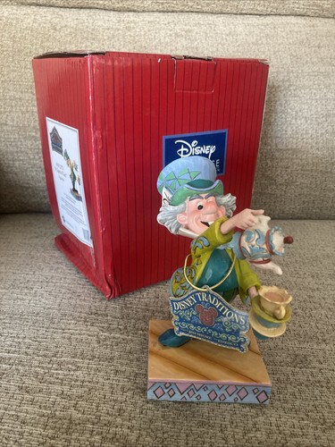 Disney traditions alice - traditions,