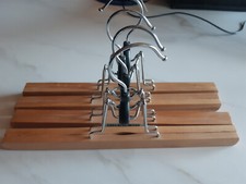 Grucce per pantaloni o gonne in legno con gancio apribile