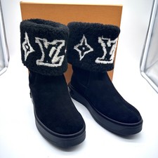 Scarpe stivaletti Louis Vuitton Snowdrop pelliccia di shearling nero scamosciato pelle di vitello 6,5