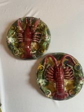 Coppia di piatti in maiolica