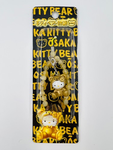 Cinturino mascotte oro - , hello
