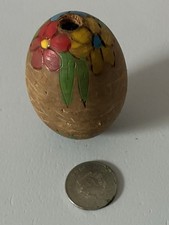 Moneta Uovo e Romania in legno