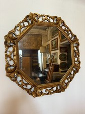 Specchi antico di forma ottagonale con cornice in legno