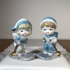 Statuine sciatori ragazzo e