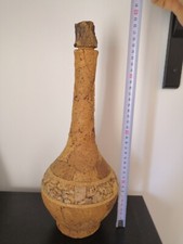 Bottiglia rivestita in sughero, con tappo