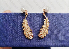 Swarovski orecchini piuma