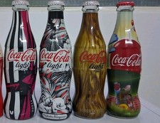 4 Bottiglie Coca Cola 