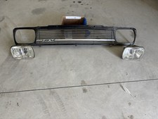 Fiat 127 griglia radiatore mascherina Fanali Carrello