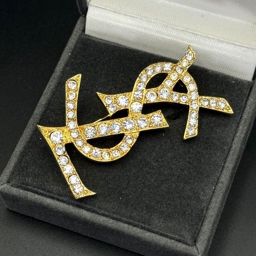 Spilla yves saint laurent - saint,