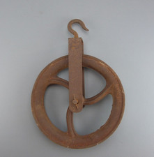 Ancienne poulie en fonte à