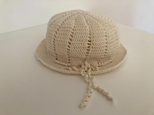 Cappello bimba lavorazione