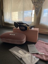 Occhiali Miu Miu Glimpse