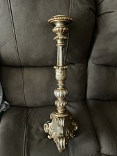 Antico candeliere in legno