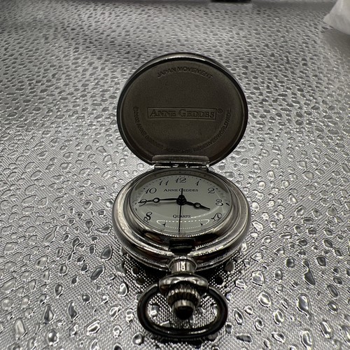 Collana con ciondolo orologio