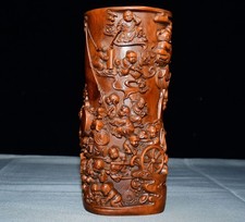 Pennello in legno intagliato a