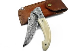COLTELLO ARTIGIANALE PIEGHEVOLE IN ACCIAIO DAMASCO MANICO OSSO COLLEZIONE CACCIA