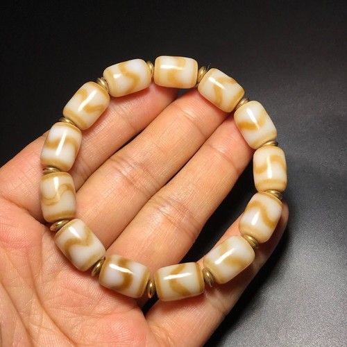 Bracciale amuleto dente - dente, di