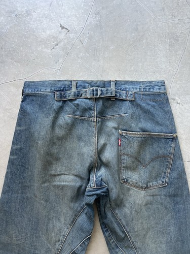 Fibbia jeans intrecciata