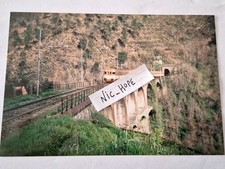 Fotografia Elettromotrice ALe 801/940 "Fanta" e rimorchi su viadotto 