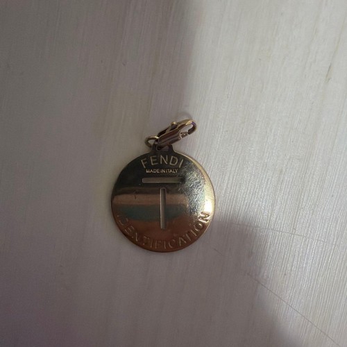 Fendi medal shaped charm with - medal,