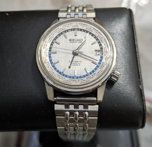 Seiko world time olympic - world,