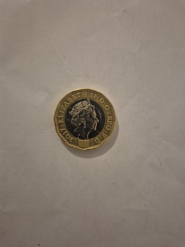 One pound coin - one,